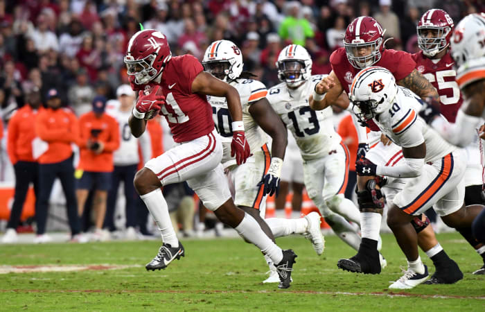 Wide receiver Traeshon Holden runs after the catch against the Auburn Tigers.